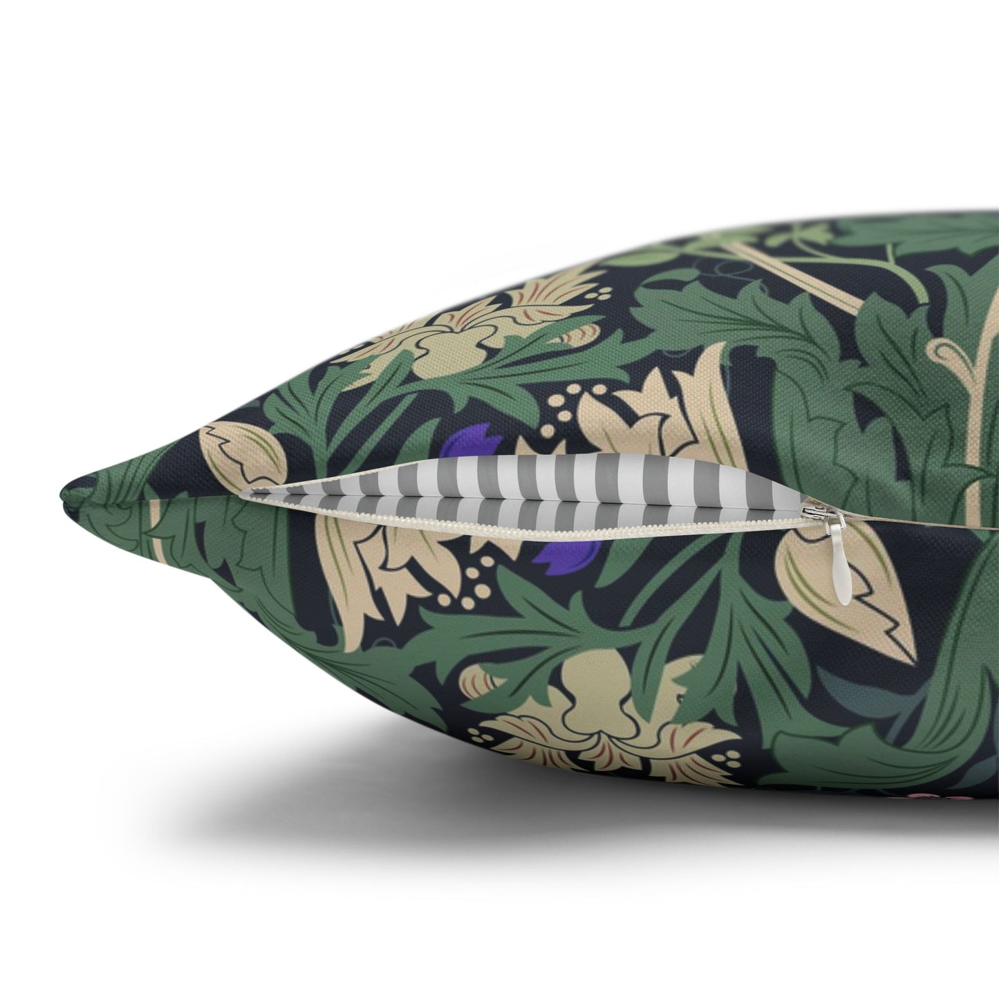 Decorative pillow with a green and beige floral pattern on a white background
