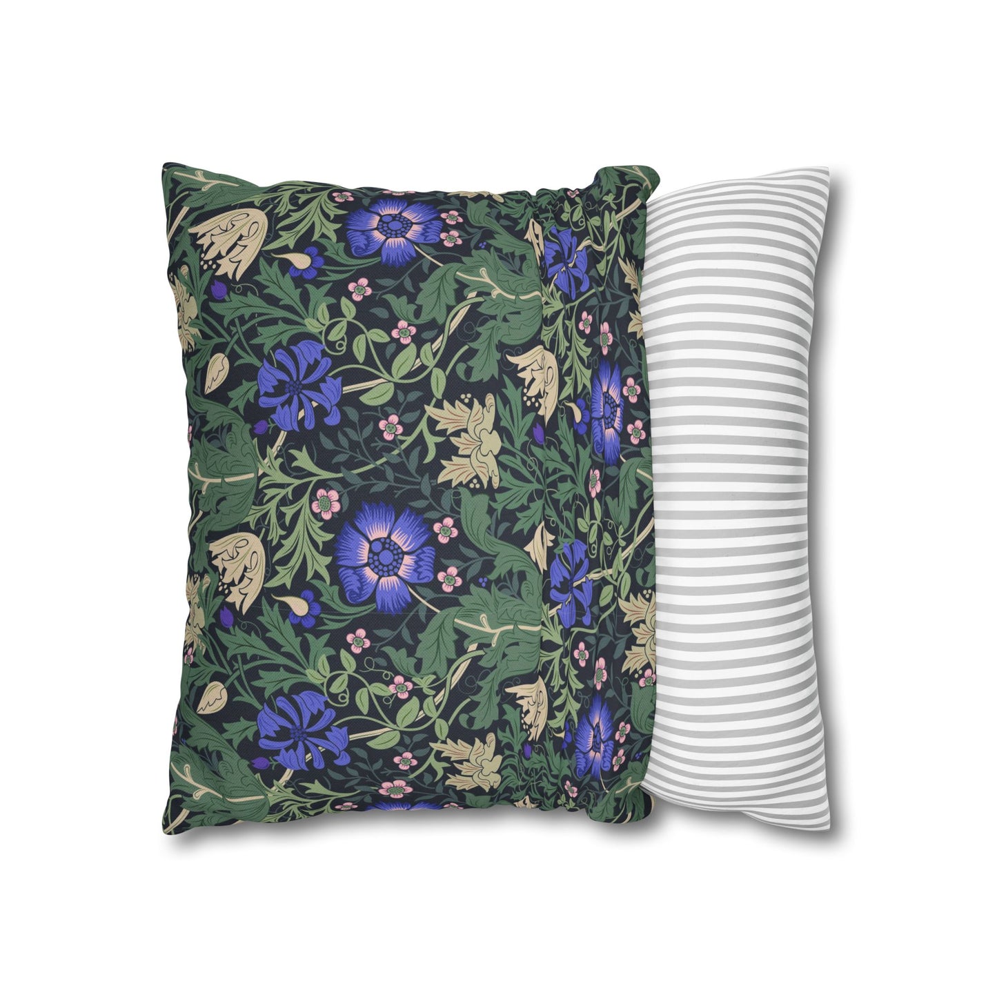 Two pillows, one with floral pattern and one with stripes, on a white background