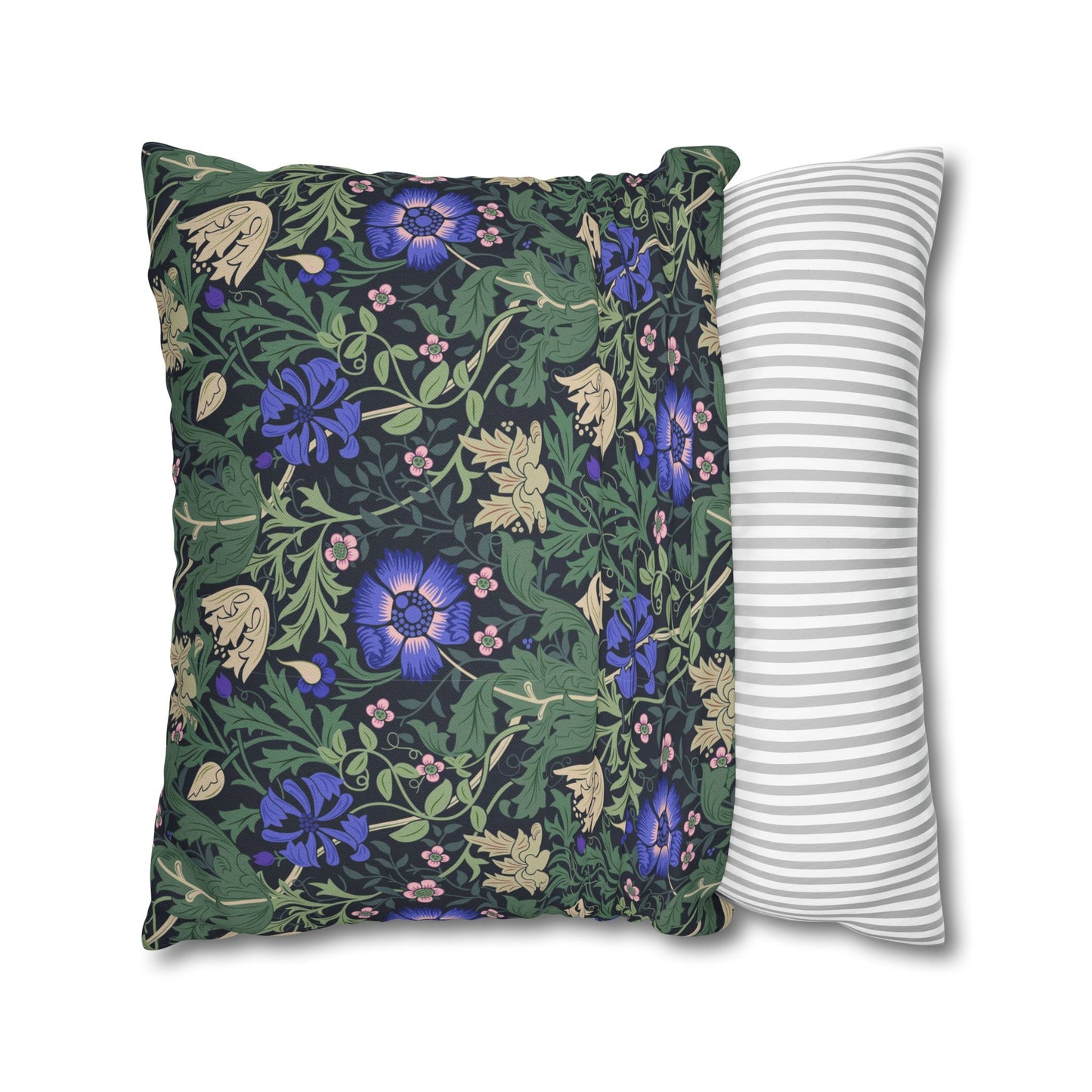 Two pillows, one with floral pattern and one with stripes, on a white background