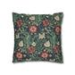 Floral patterned pillow with red, green, and beige colors on a white background