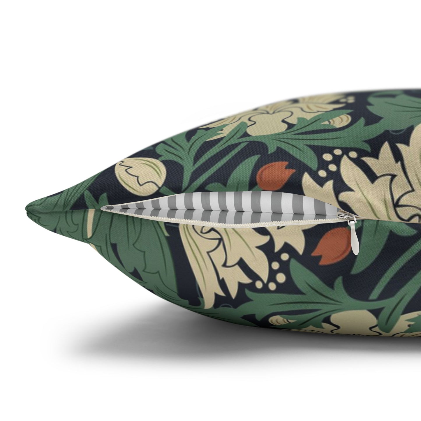 Floral-patterned pillow with a zipper on a white background