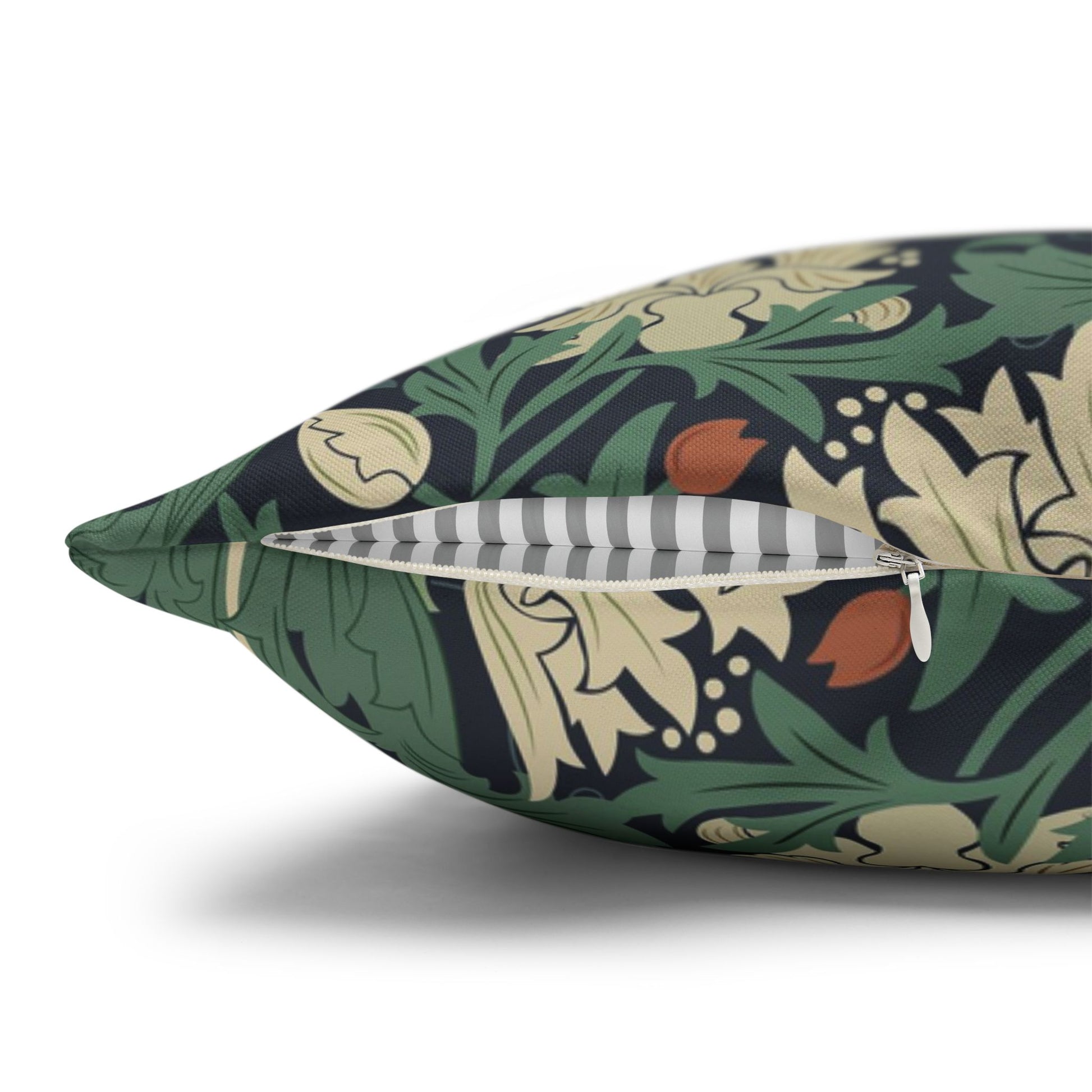 Floral-patterned pillow with a zipper on a white background
