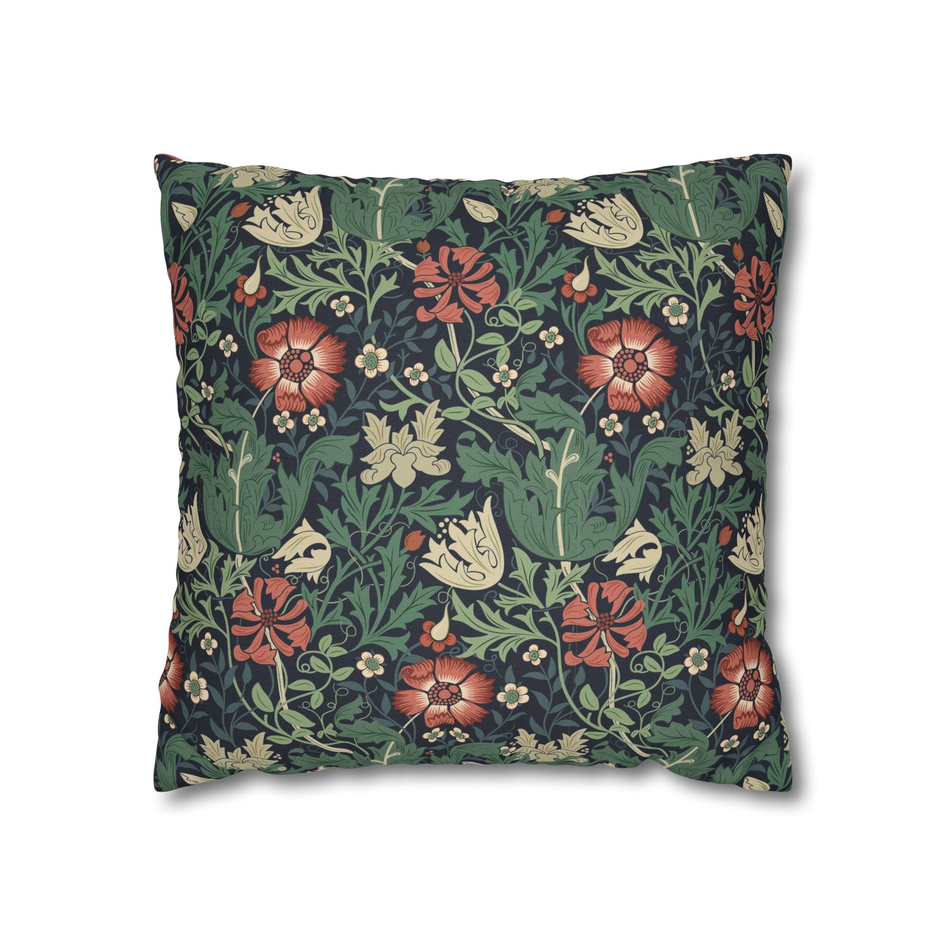 Floral patterned pillow with red, green, and beige colors on a white background