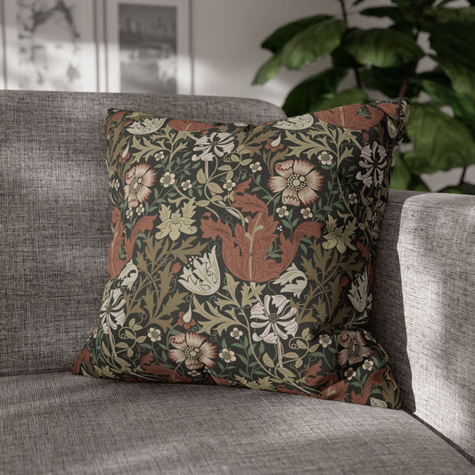 Decorative pillow with floral pattern on a gray sofa
