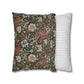 Decorative pillow with floral and animal pattern next to a striped pillow on a white background