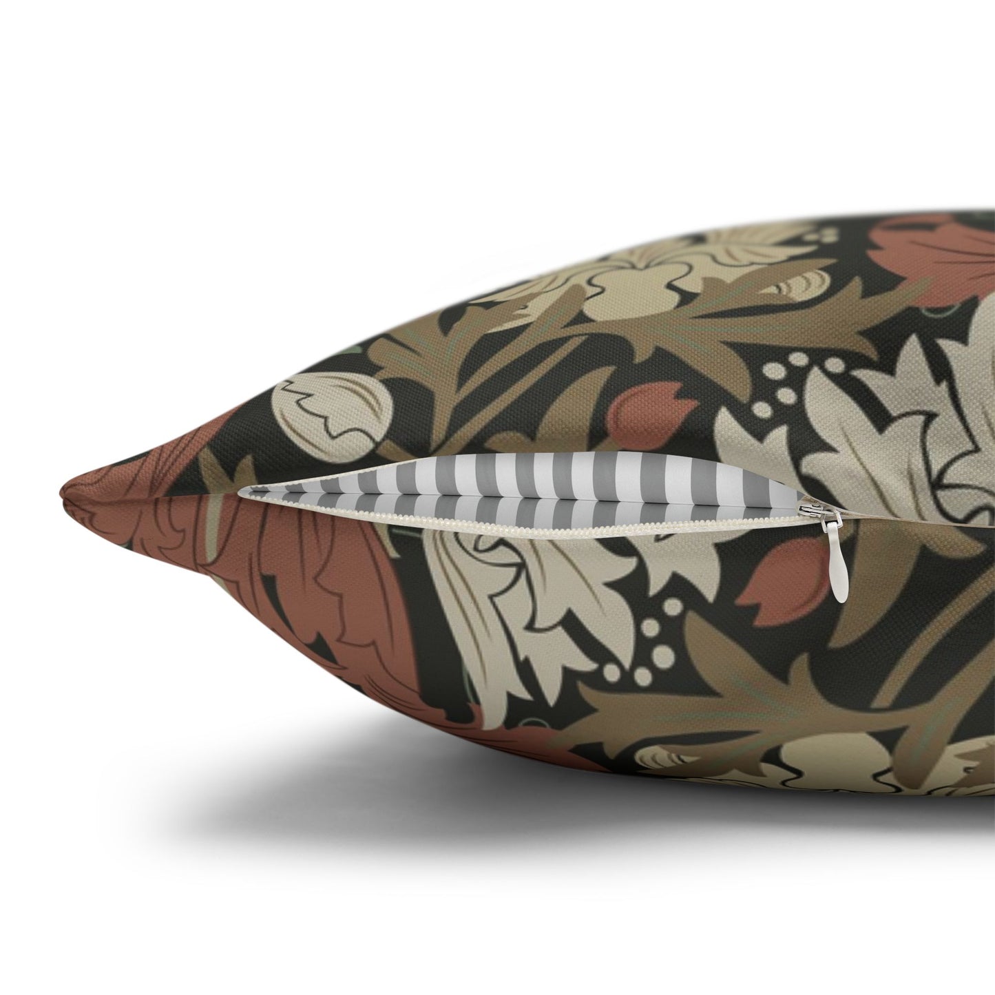 Decorative pillow with floral pattern and zipper on a white background