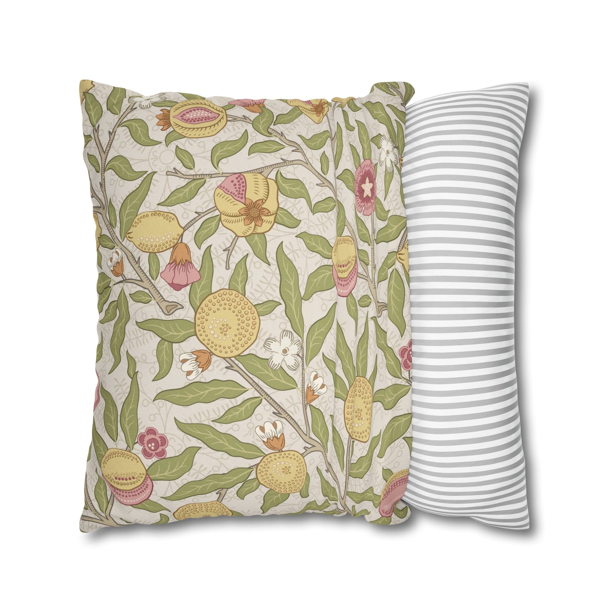 Two pillows, one with floral pattern and one with stripes, on a white background