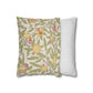 Floral-patterned pillow next to a striped pillow on a white background
