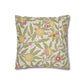 Decorative pillow with floral and fruit pattern on a white background