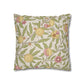 Decorative pillow with floral and fruit pattern on a white background