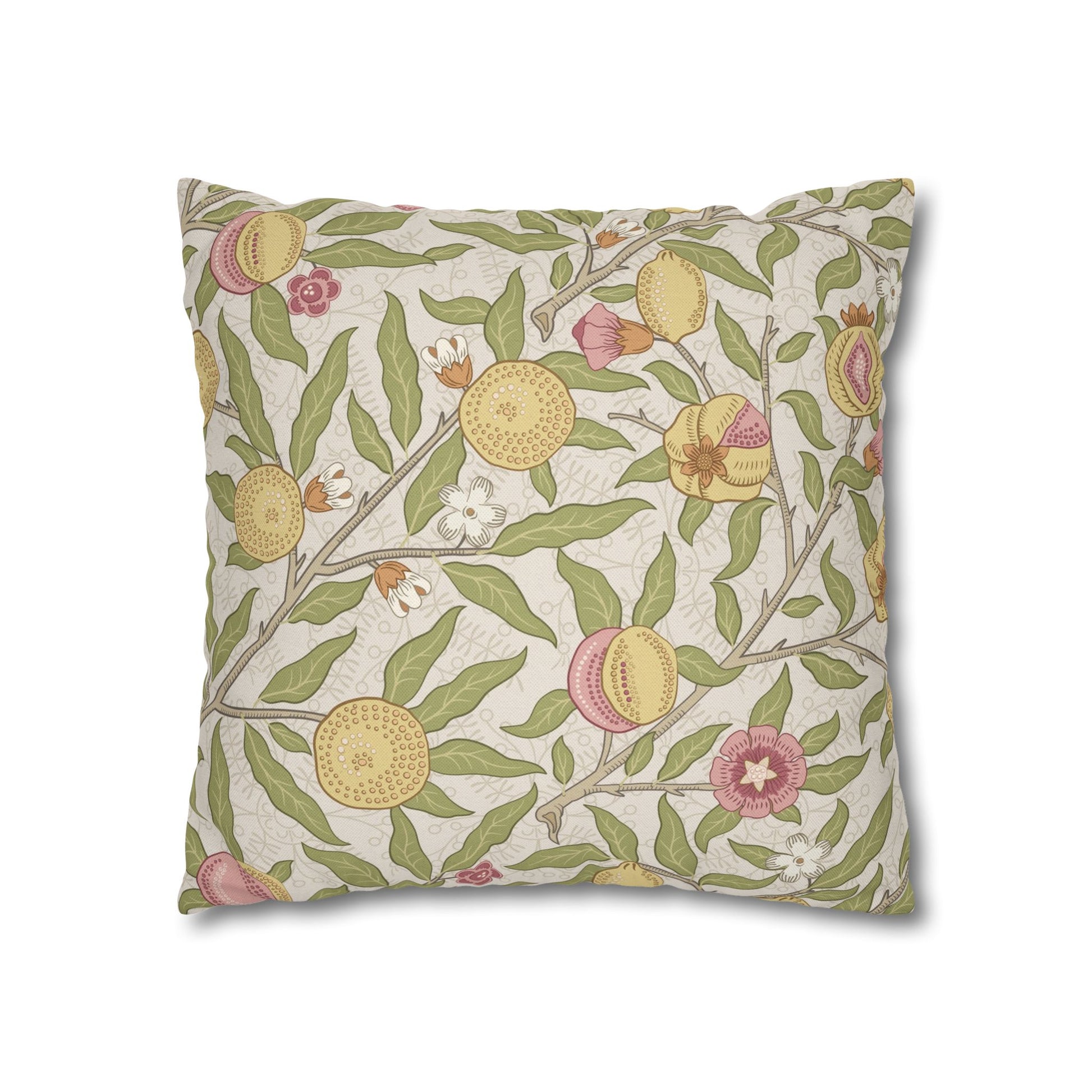 Decorative pillow with floral and fruit pattern on a white background