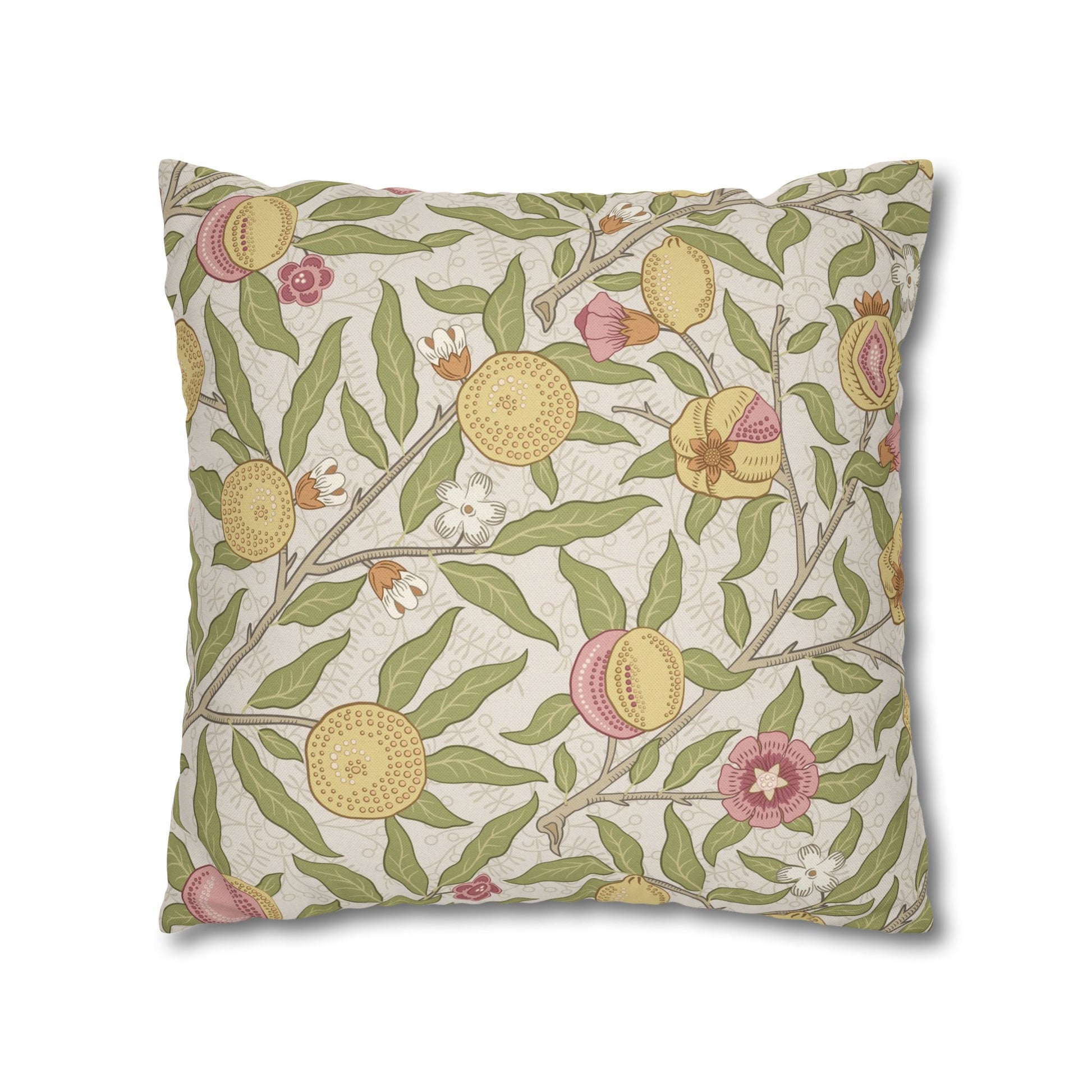 Decorative pillow with floral and fruit pattern on a white background