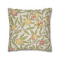 Decorative pillow with floral and fruit pattern on a beige background