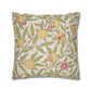 Decorative pillow with floral and fruit pattern on a beige background