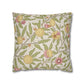 Decorative pillow with floral and fruit pattern on a beige background