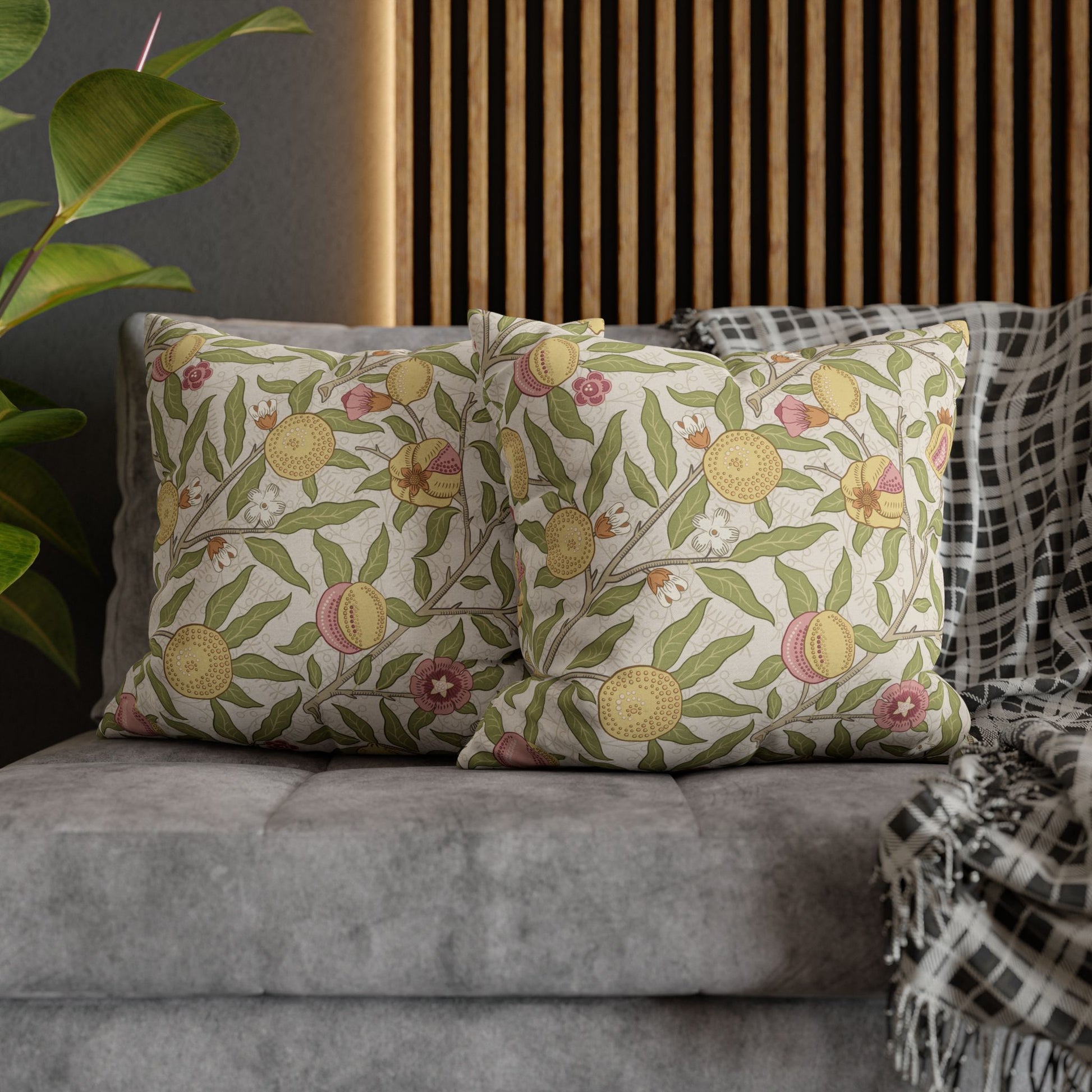Decorative pillows with face patterns on a sofa