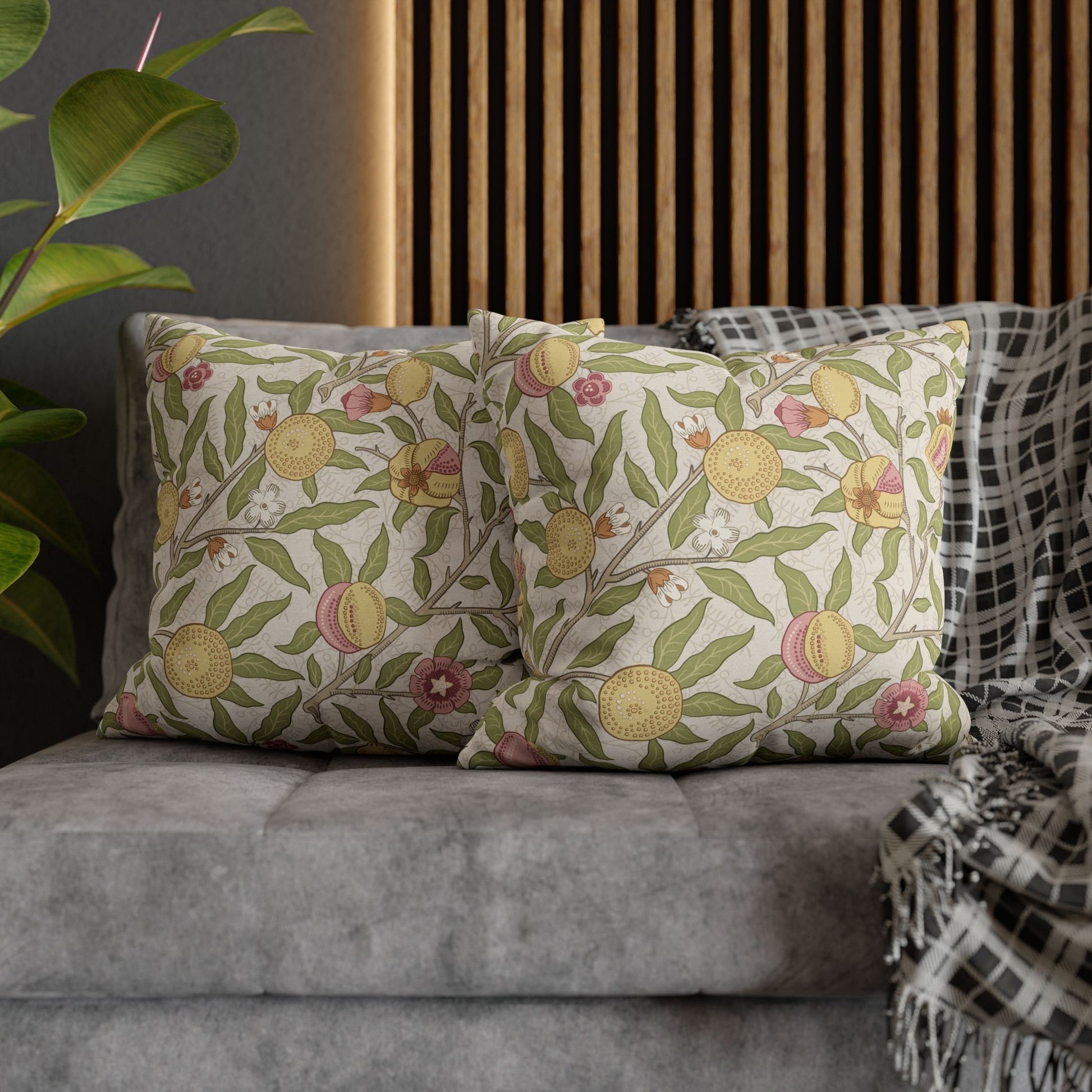 Decorative pillows with face patterns on a sofa
