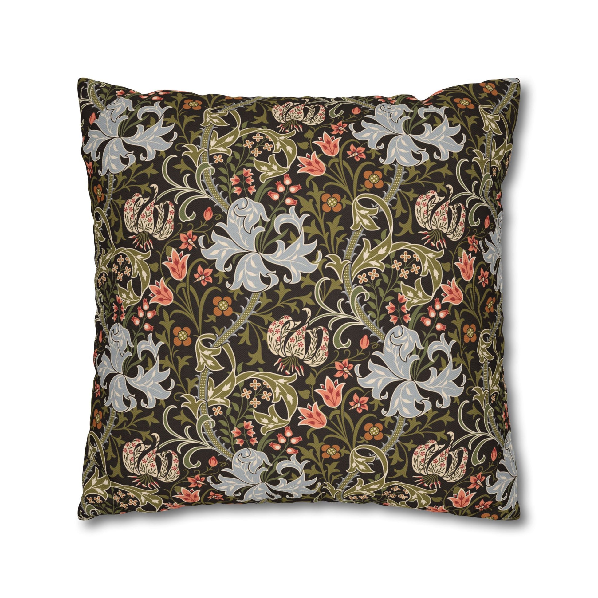 Decorative pillow with floral and paisley pattern on a dark background