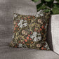 Decorative pillow with floral pattern on a gray sofa