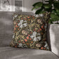 Decorative pillow with floral pattern on a gray sofa