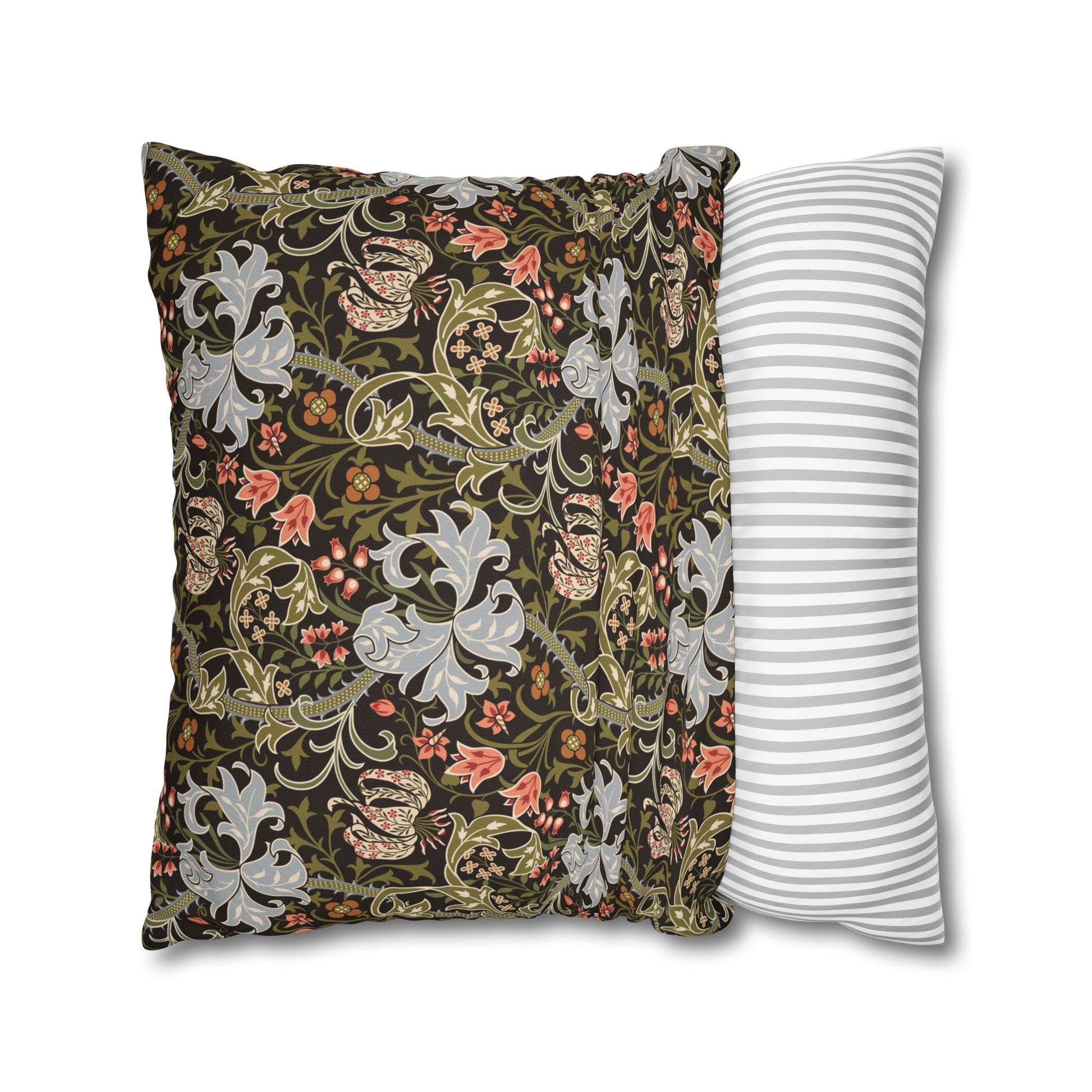 Two pillows, one with floral pattern and one with stripes, on a white background