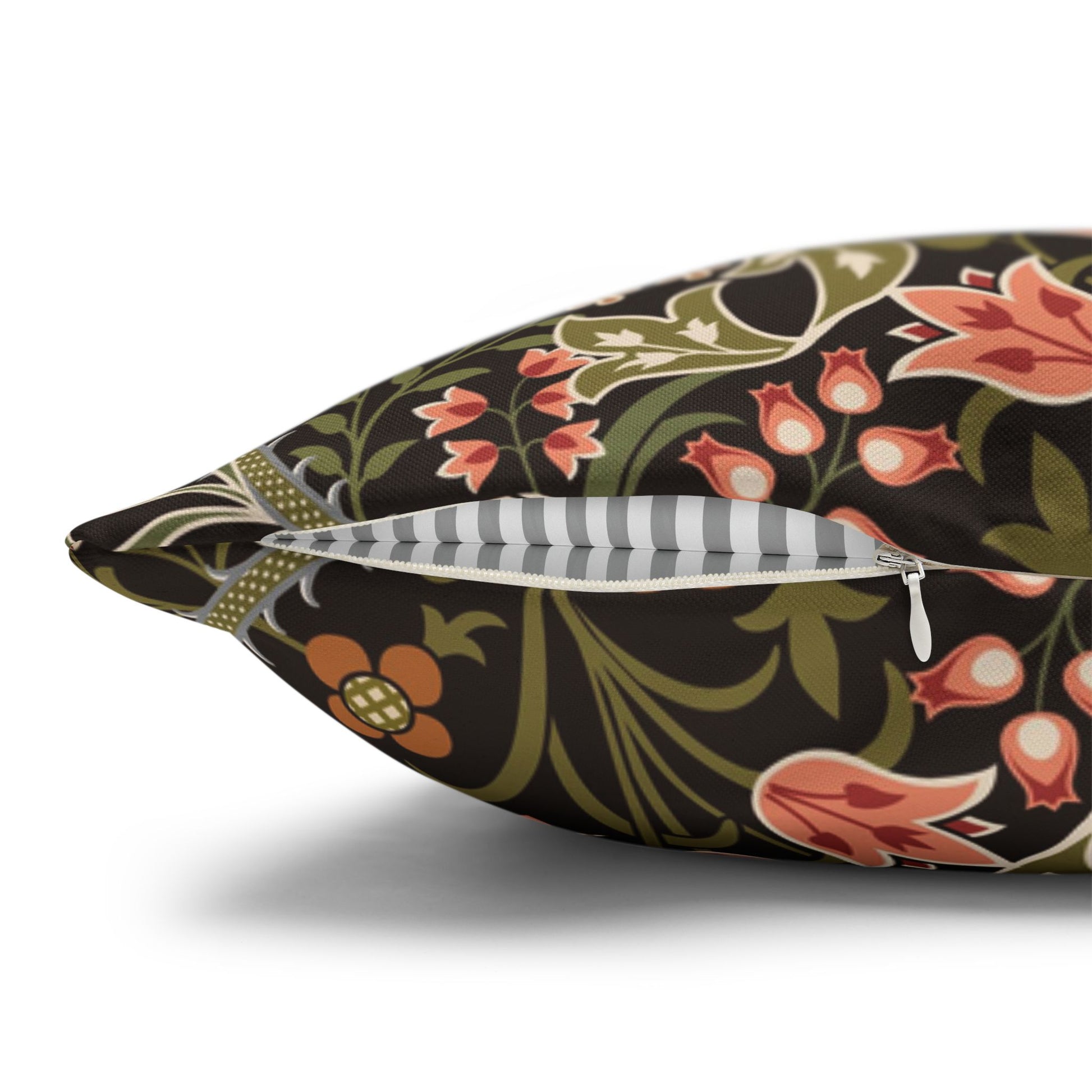 Floral-patterned pillow with a zipper on a white background