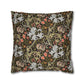 Decorative pillow with intricate floral and animal pattern on a dark background