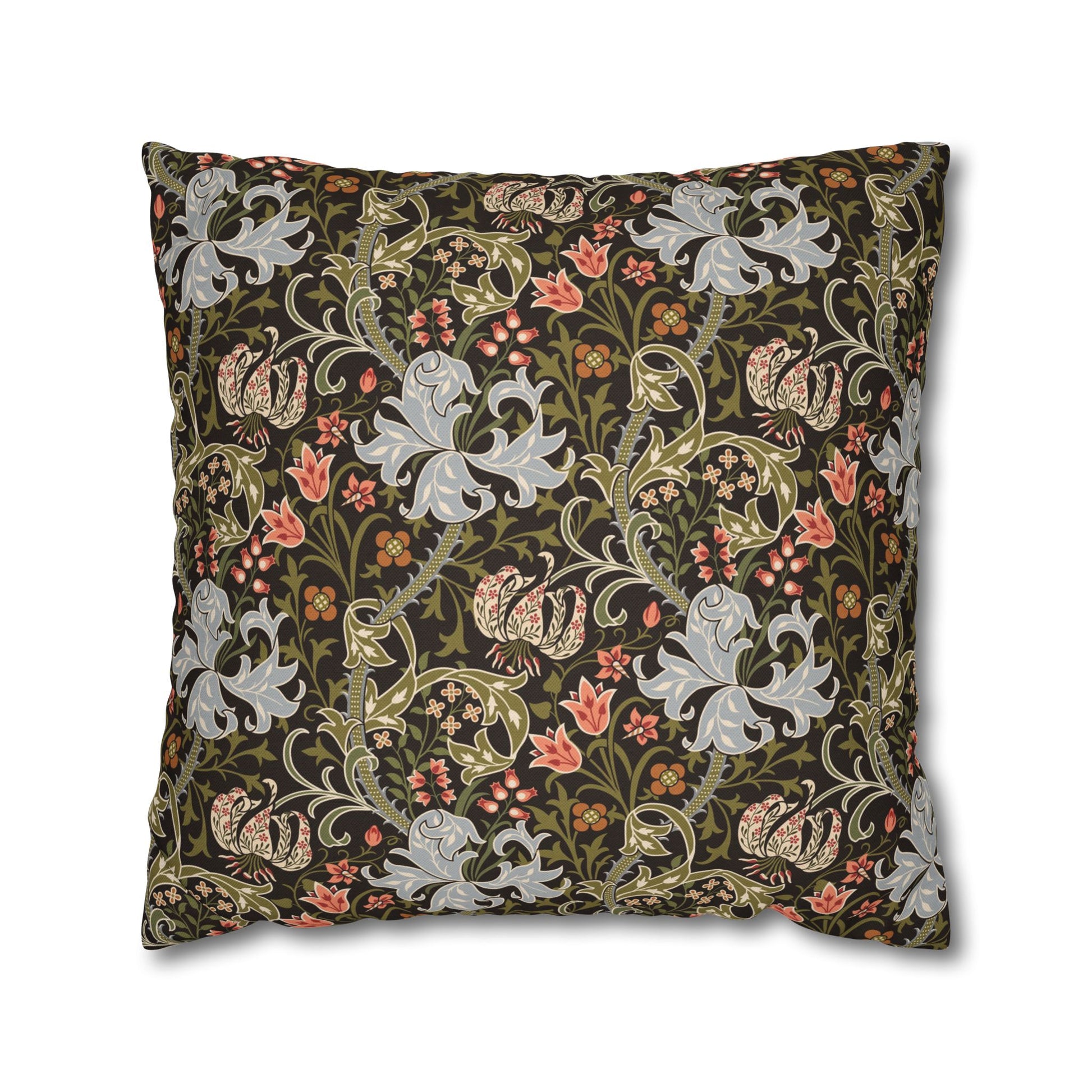 Decorative pillow with intricate floral and animal pattern on a dark background