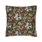 Decorative pillow with intricate floral and animal pattern on a dark background