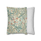 Two pillows, one with floral pattern and one with stripes, on a white background