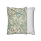 Two pillows, one with floral pattern and one with stripes, on a white background
