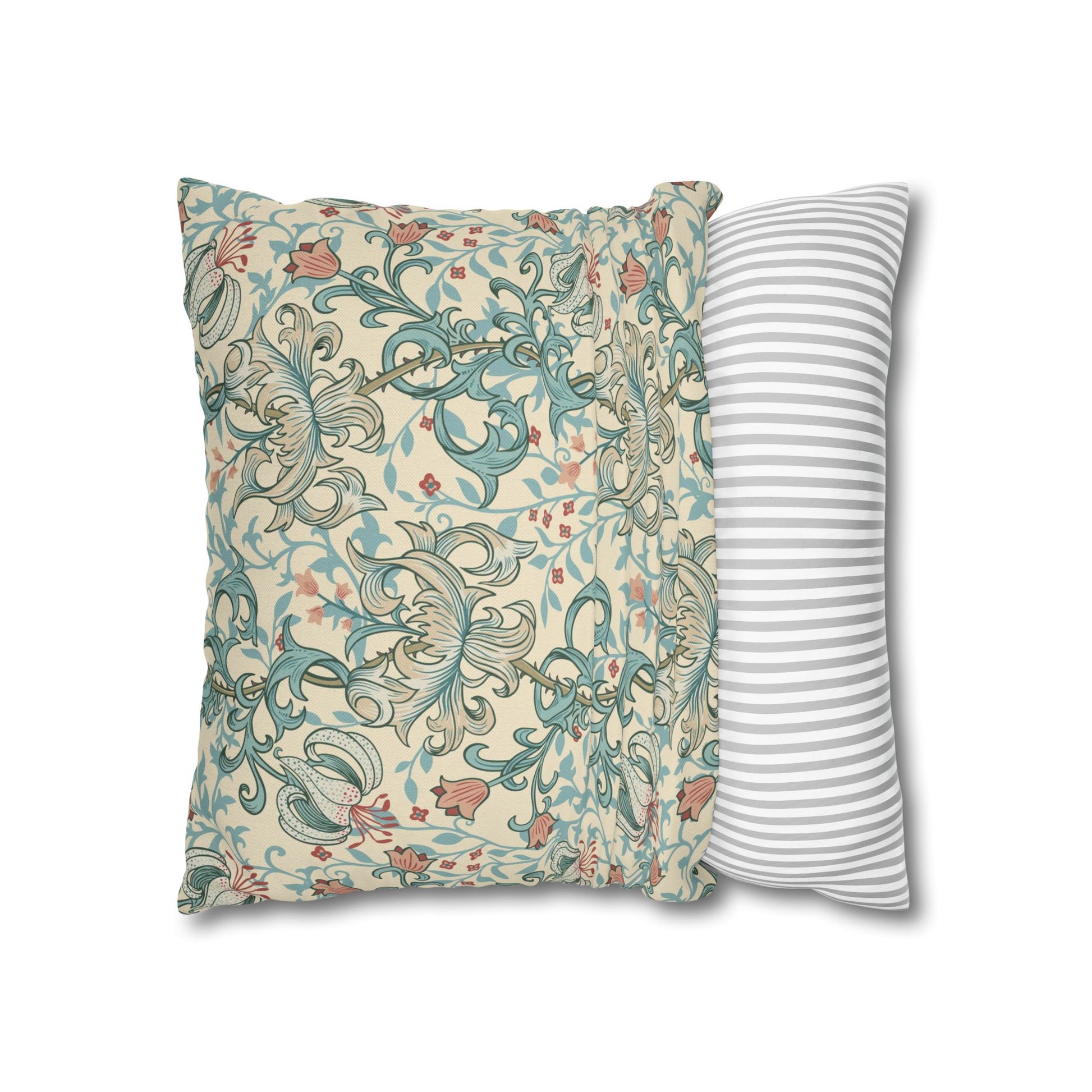 Two pillows, one with floral pattern and one with stripes, on a white background