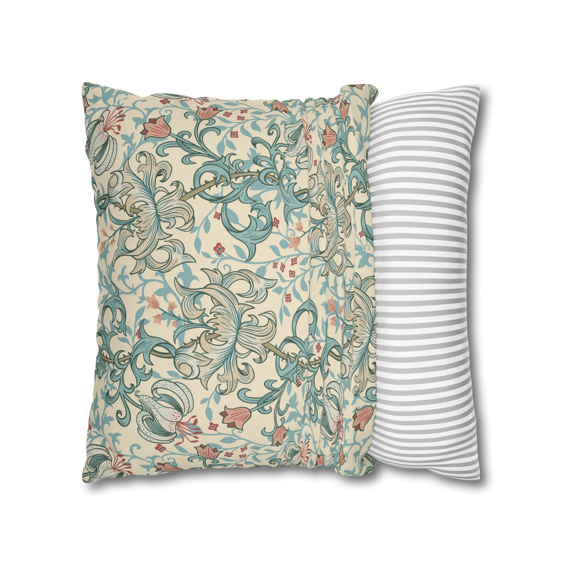 Two pillows, one with a floral pattern and the other with a striped pattern, on a white background.