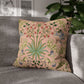 Decorative pillow with floral pattern on a gray sofa
