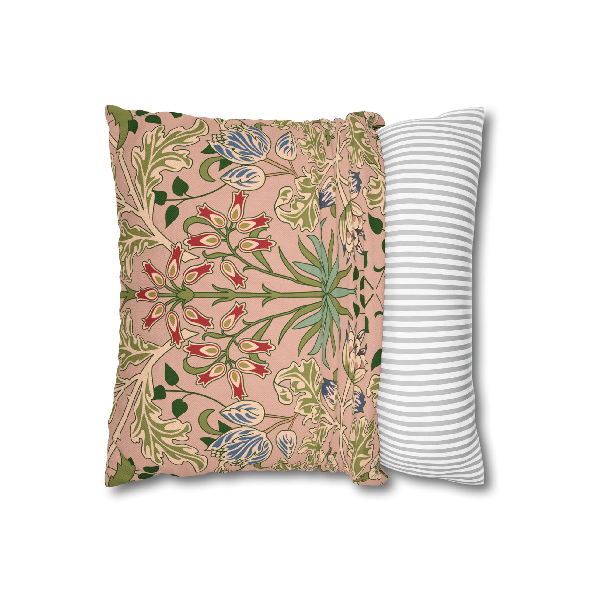 Floral-patterned pillow and a striped pillow on a white background