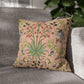 Decorative pillow with floral pattern on a gray sofa