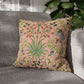 Decorative pillow with floral pattern on a gray sofa