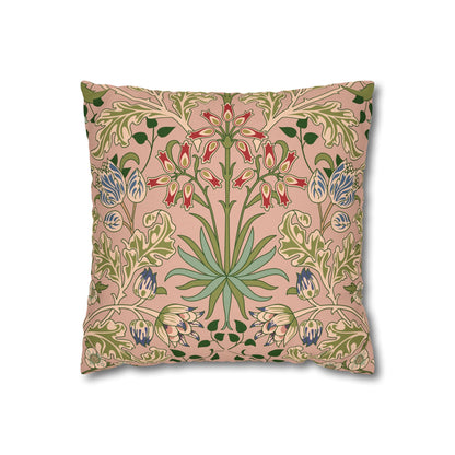 Decorative pillow with floral pattern on a pink background
