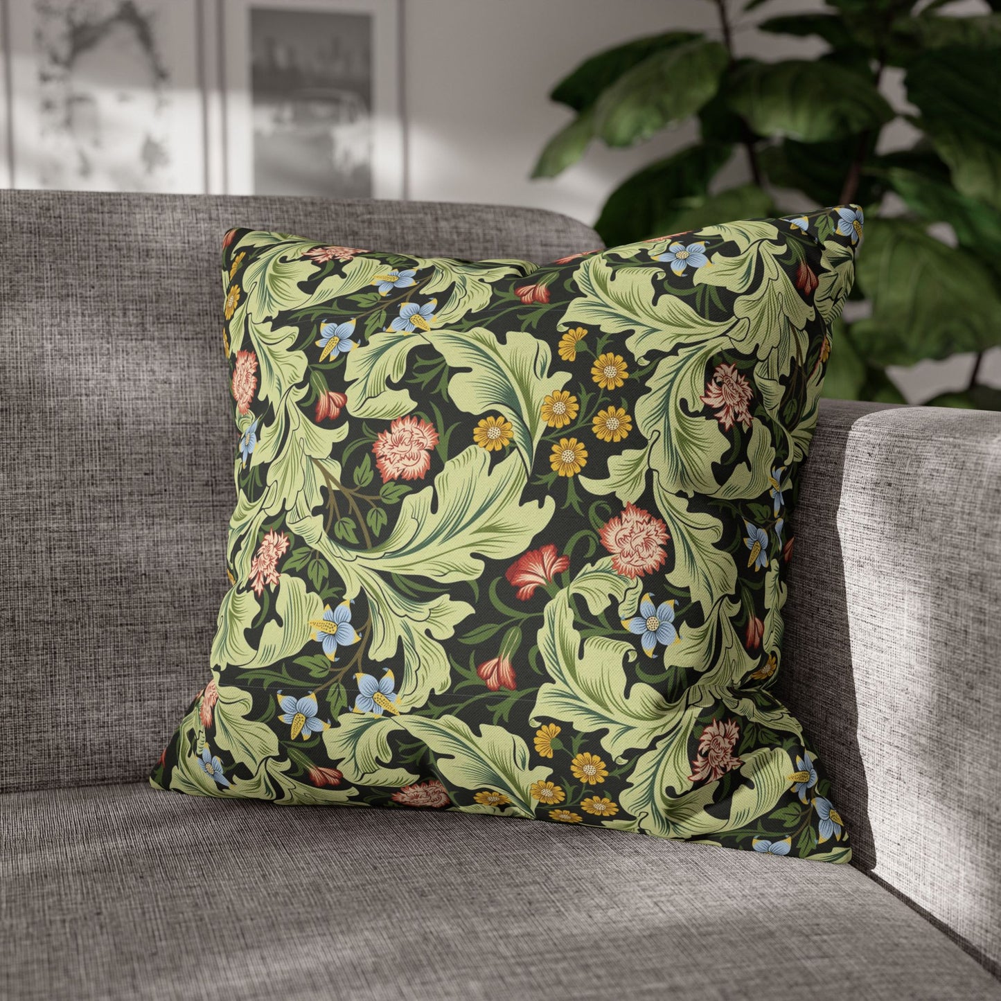 Decorative pillow with floral pattern on a gray sofa - William Morris Leicester