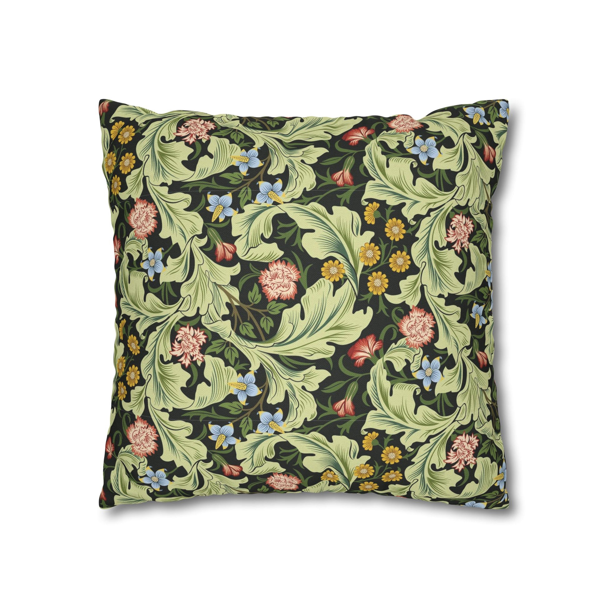 Decorative pillow with floral and leaf pattern on a white background - William Morris Leicester
