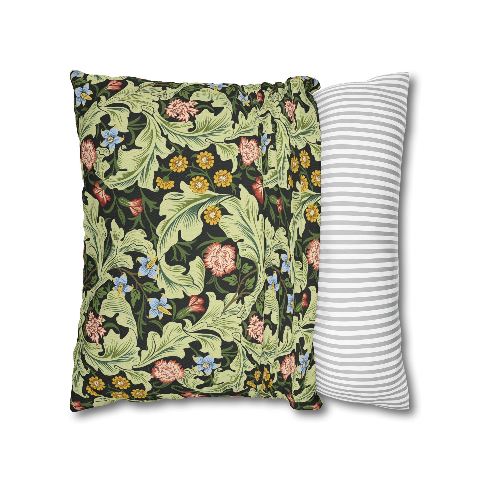 Two pillows, one with a floral pattern and the other with a striped pattern, on a white background - William Morris Leicester