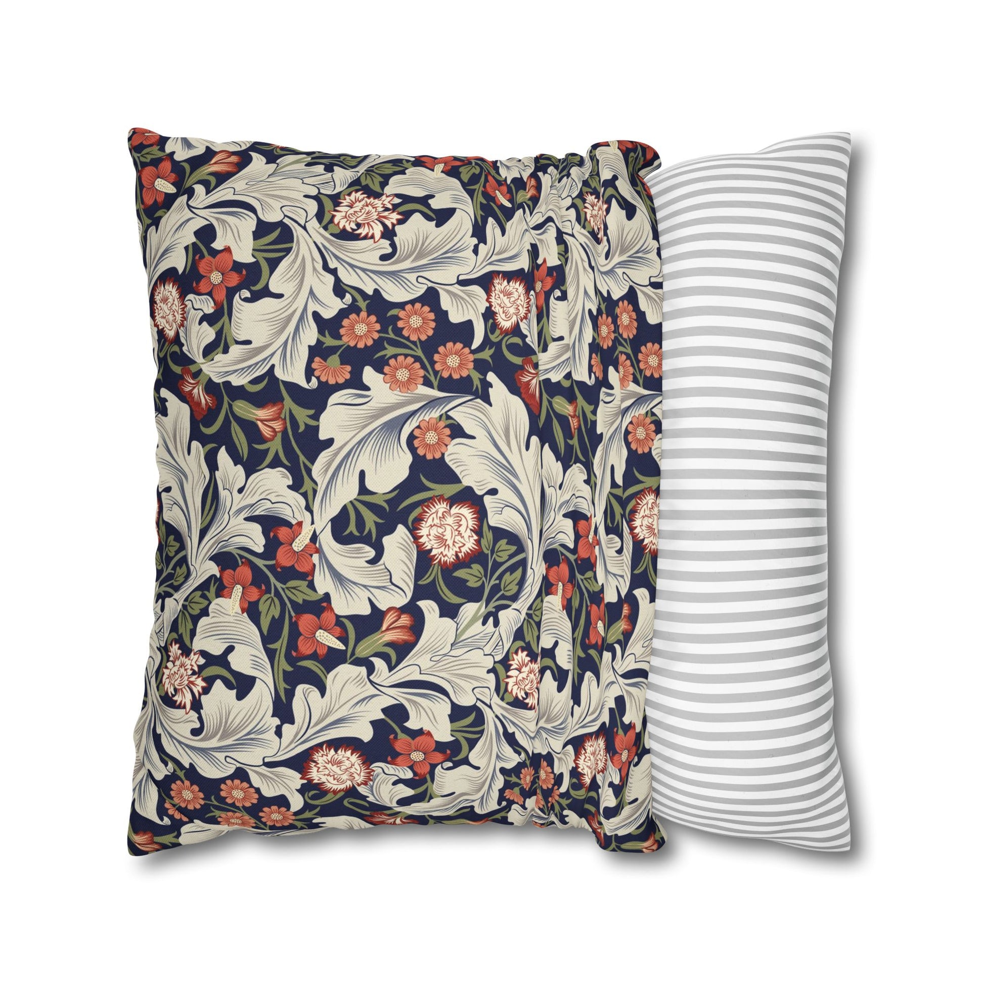 Floral-patterned pillow and a striped pillow on a white background