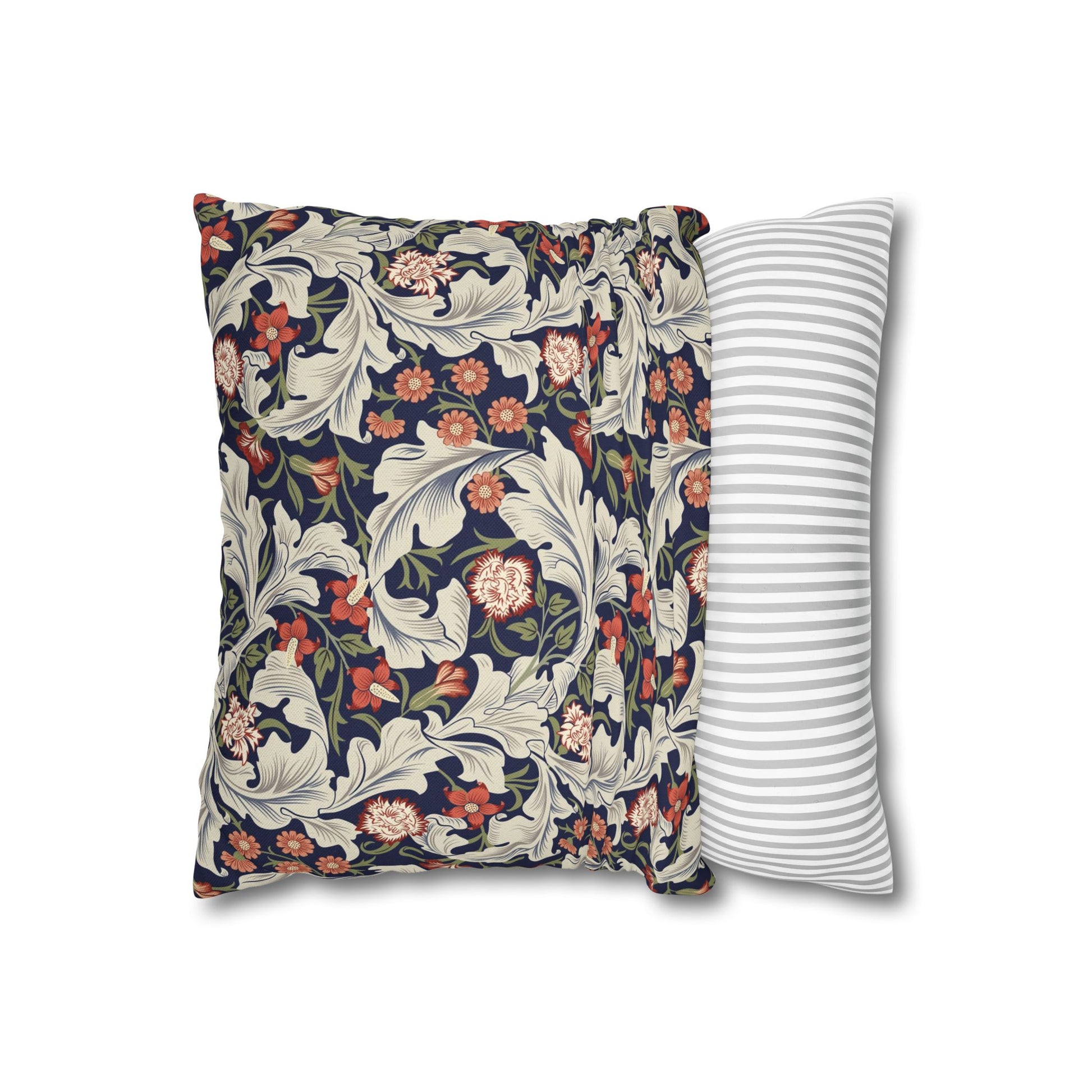 Floral-patterned pillow and a striped pillow on a white background