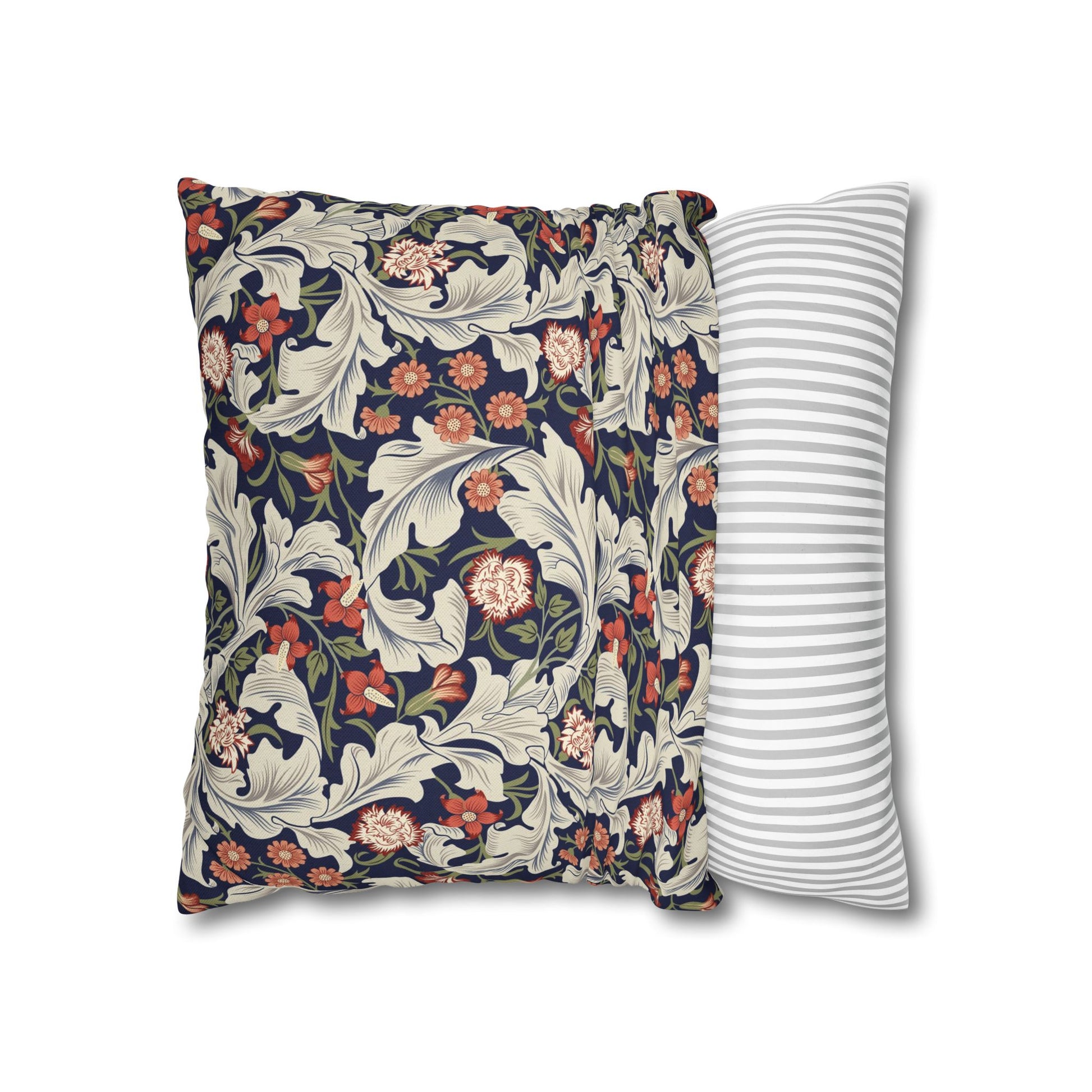 Floral-patterned pillow and a striped pillow on a white background