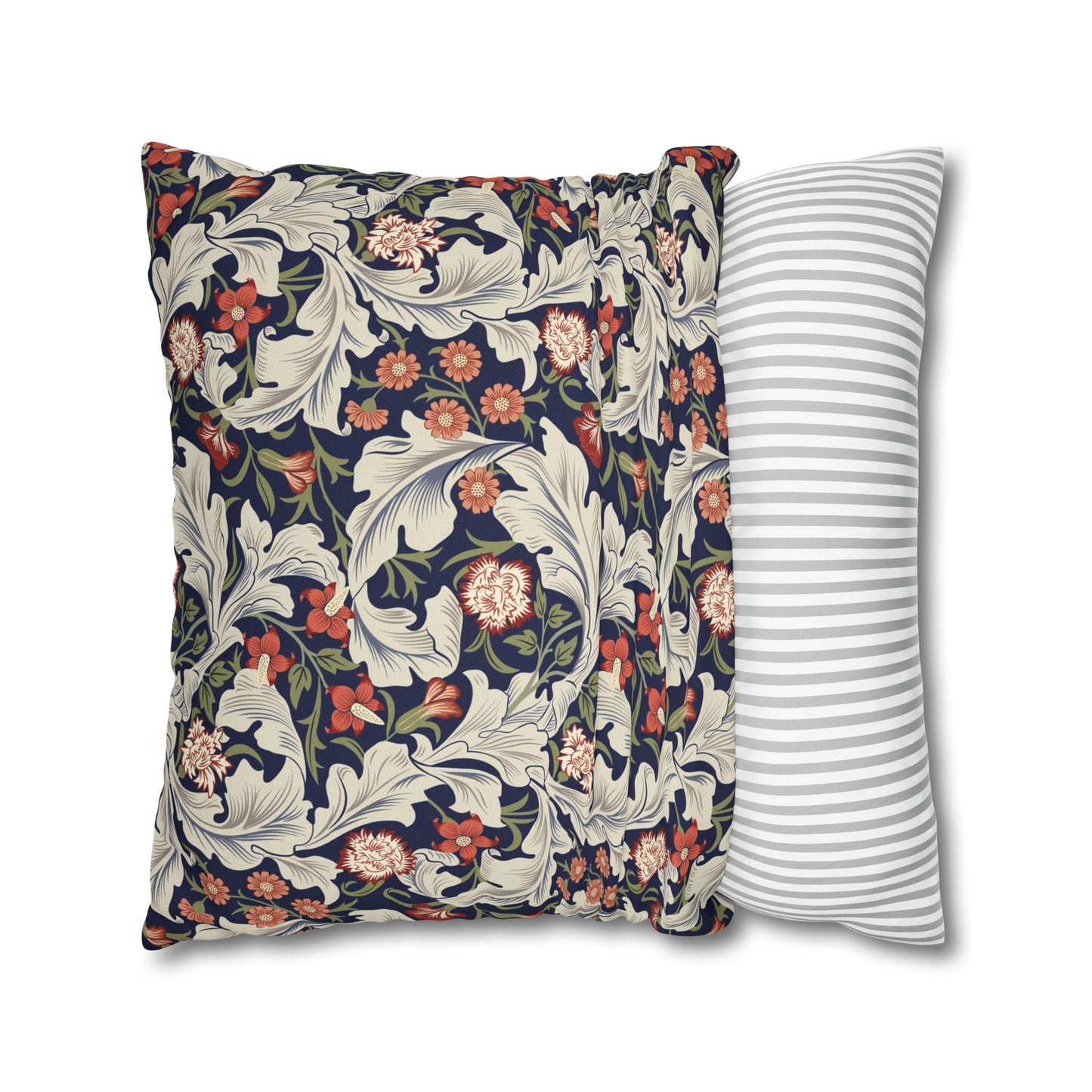 Two pillows, one with floral pattern and one with stripes, on a white background