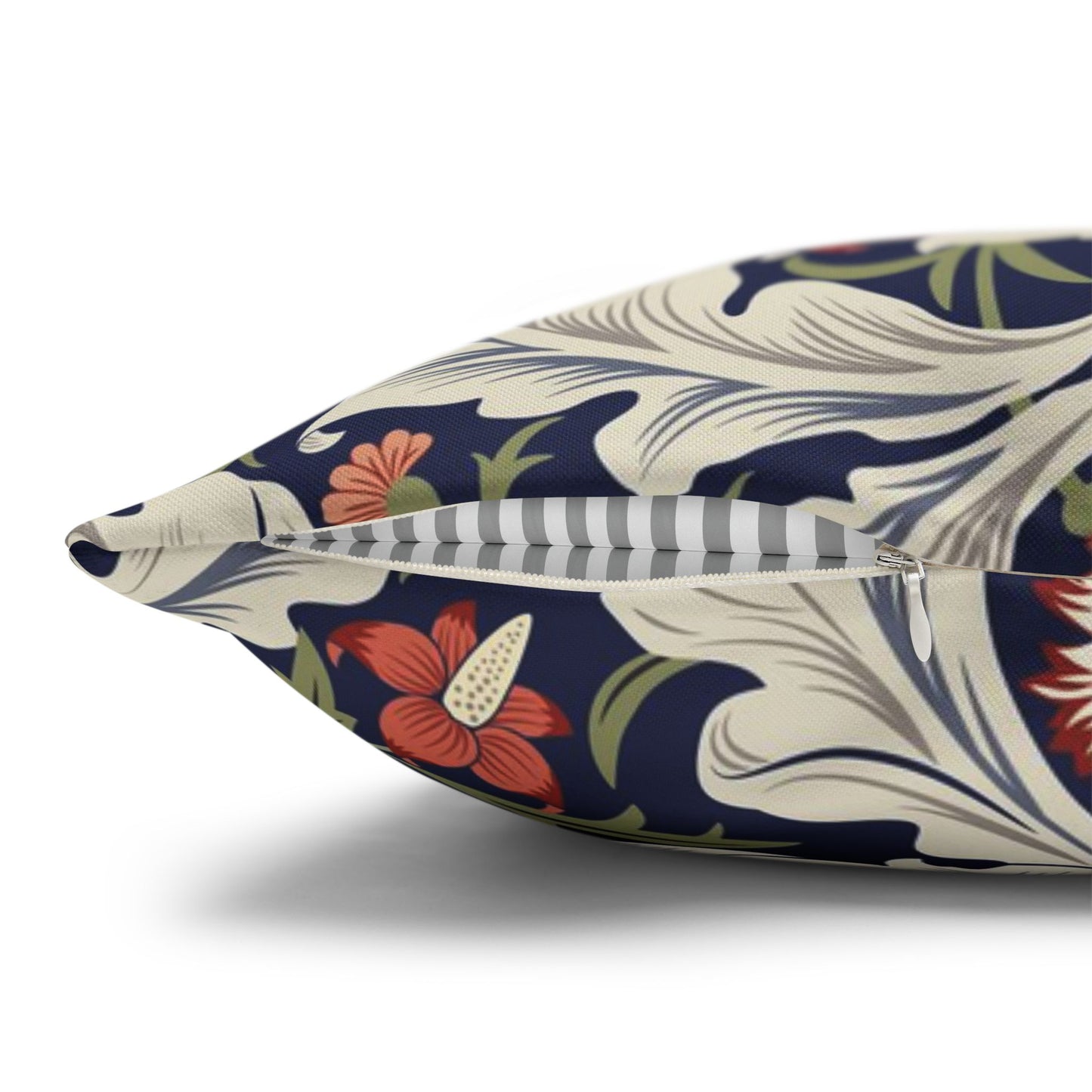 Decorative pillow with floral and abstract pattern on a white background