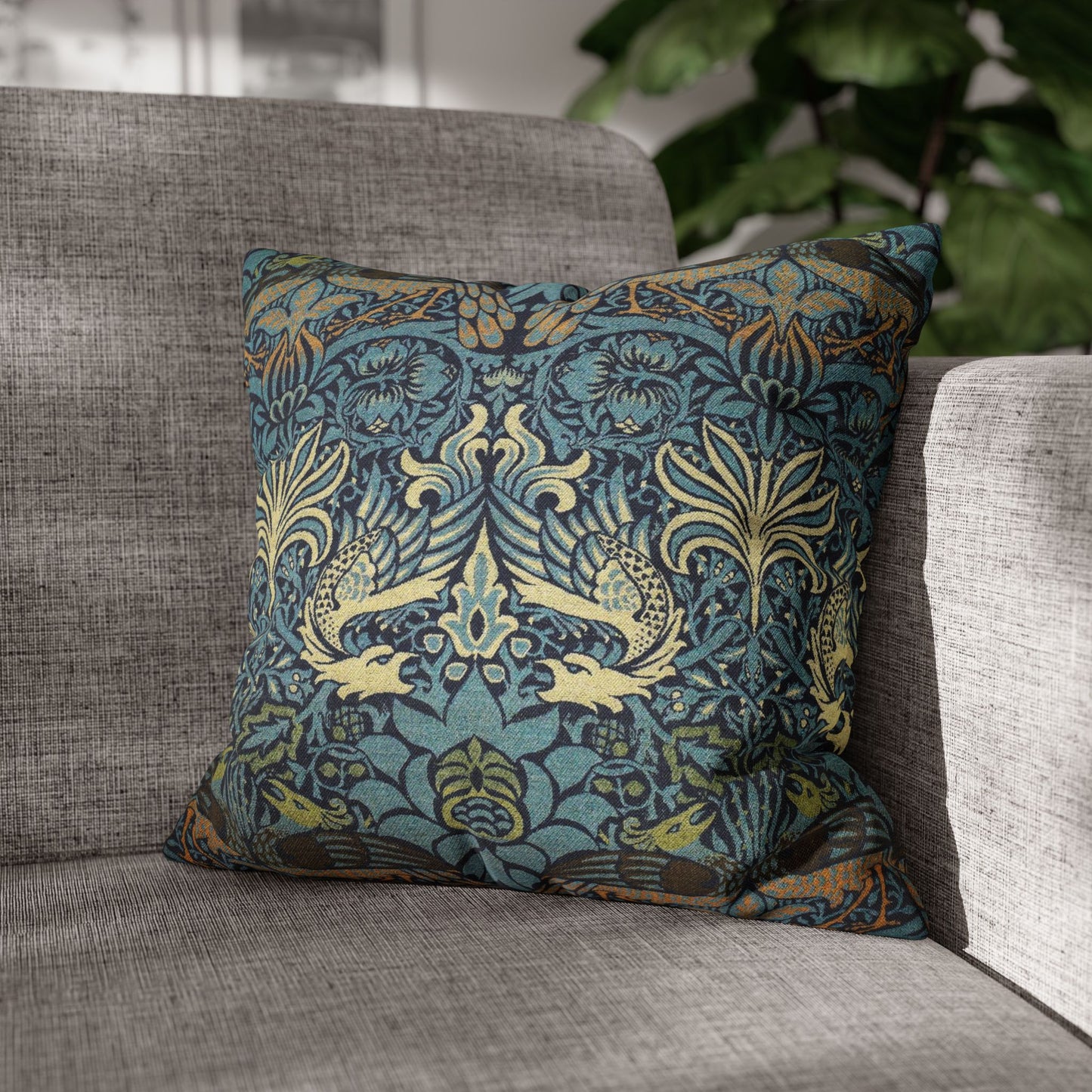 Decorative pillow with floral pattern on a gray sofa