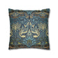 Decorative pillow with a blue and gold pattern on a white background