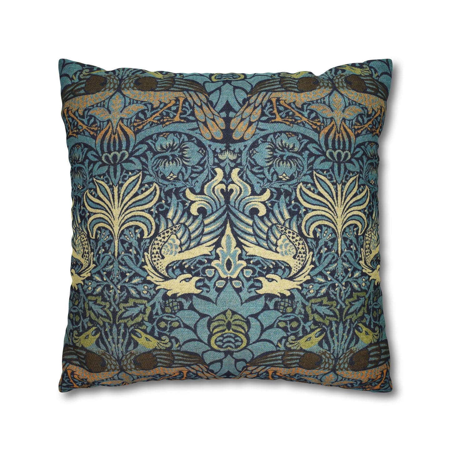Decorative pillow with intricate floral and bird pattern on a blue background
