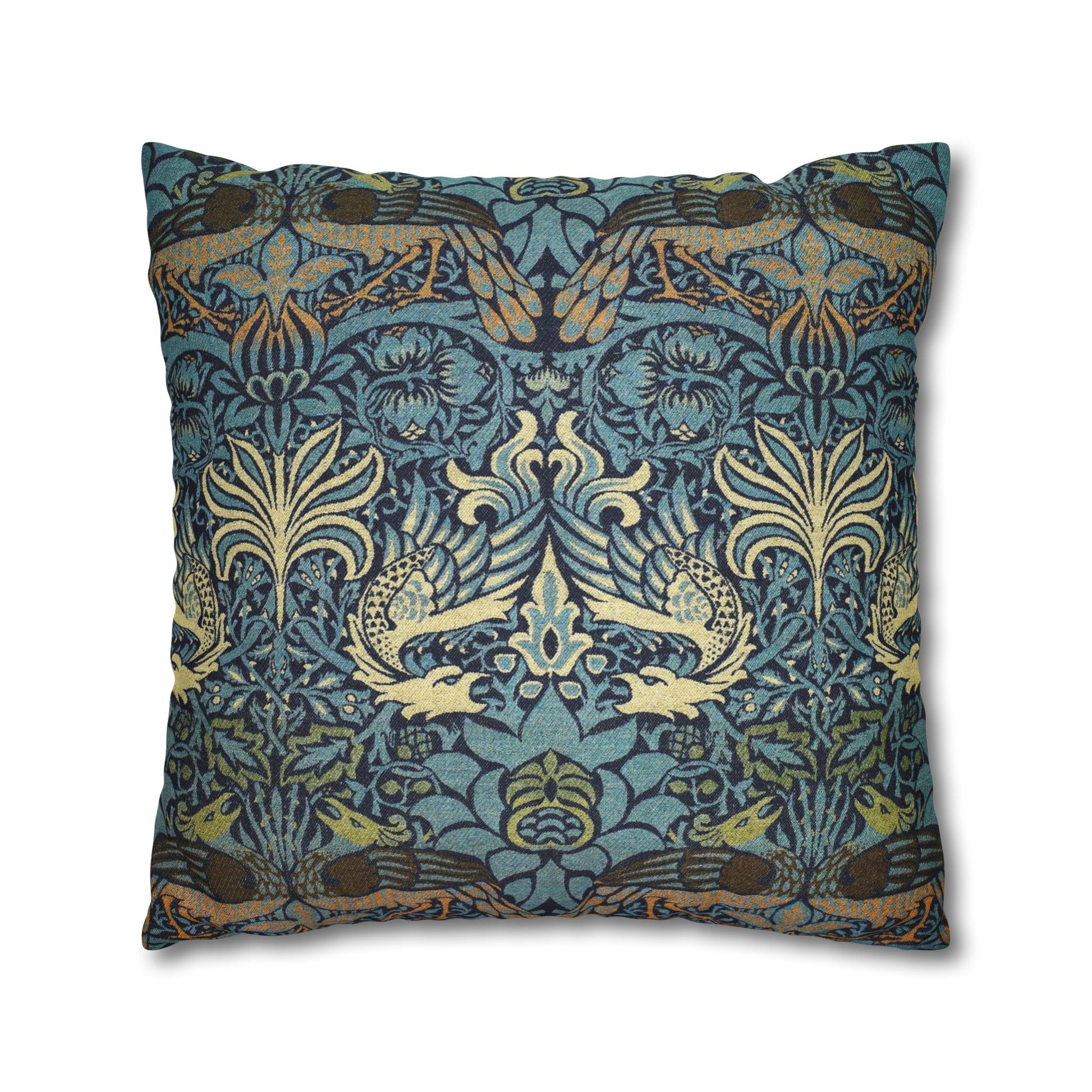 Decorative pillow with intricate blue and gold pattern on a white background